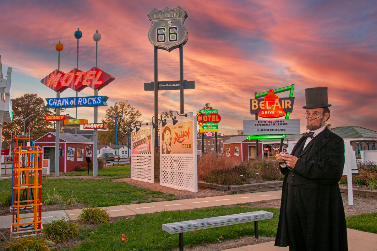 Route 66 roadside signs and an Abraham Lincoln figure in Springfield, Illinois
