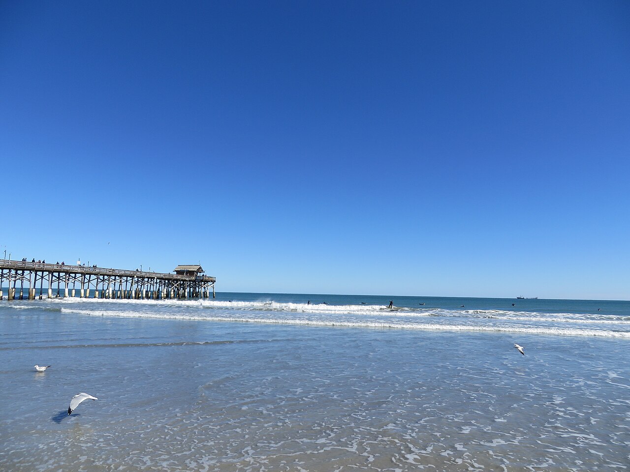 Surfing at the Cocoa Beach Pier, Cocoa Beach, Florida